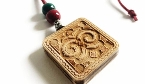 Pendant with Ainu pattern